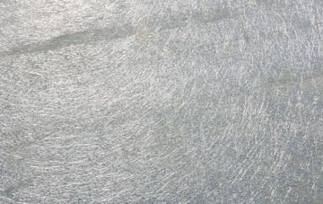 Poverest laminate fibreglass or shingles?